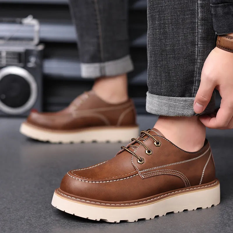 Men's black low-top Martin boots with round toe and non-slip rubber sole