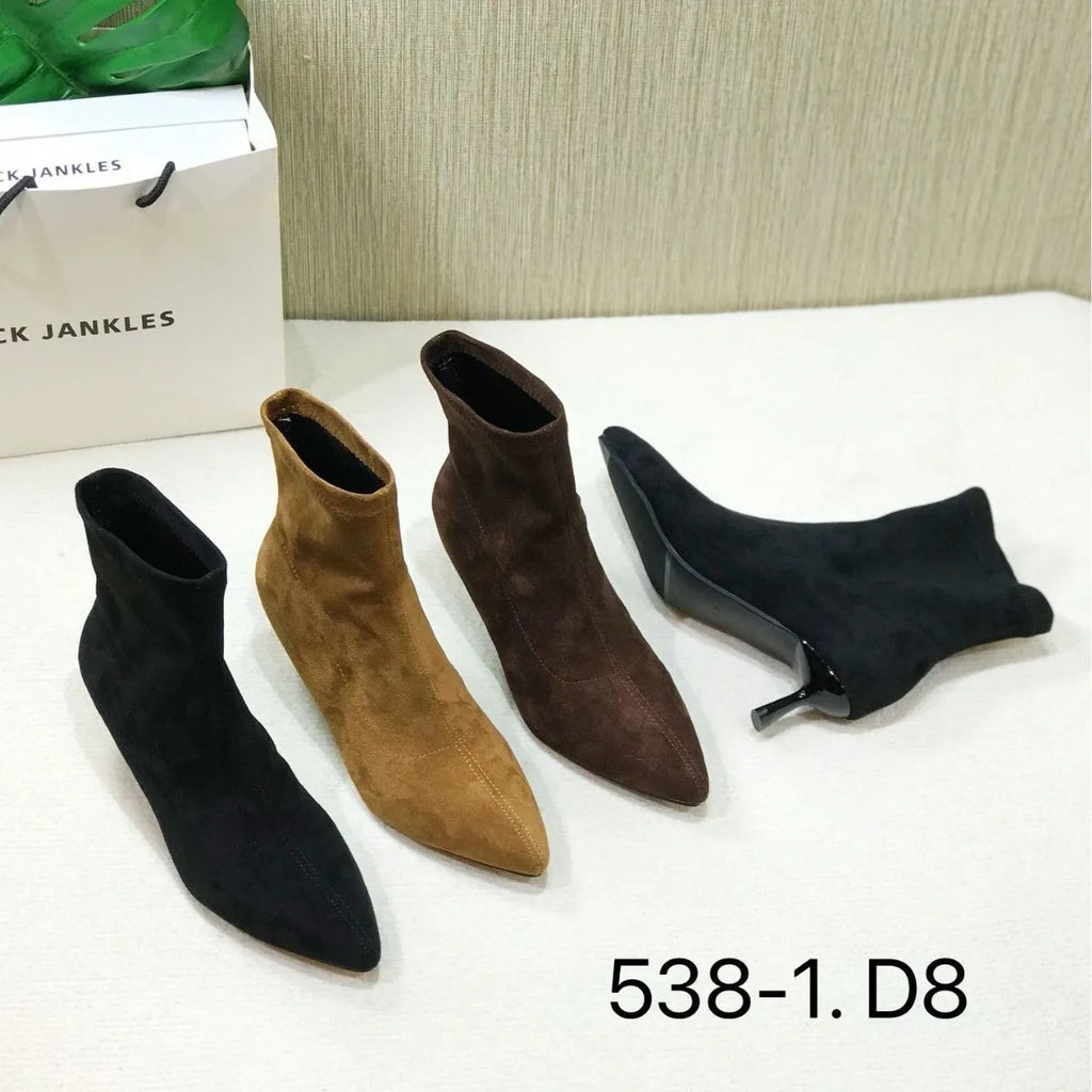 Women's black pointed toe ankle boots with stiletto heel and mid-calf height