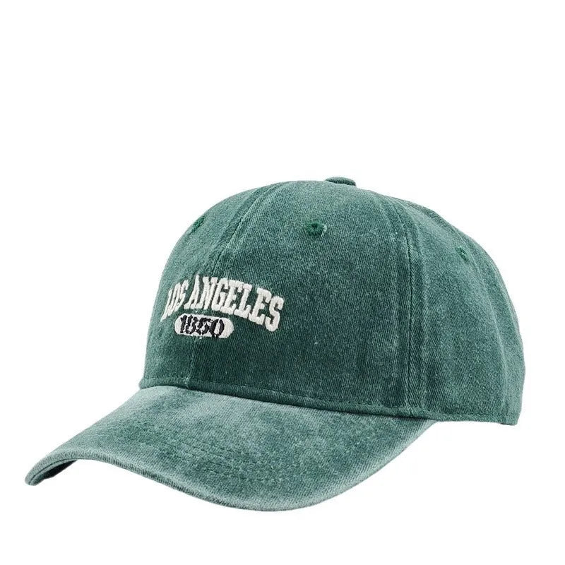 Retro personalised embroidered peaked cap in acrylic fabric with adjustable fit and distressed lettering