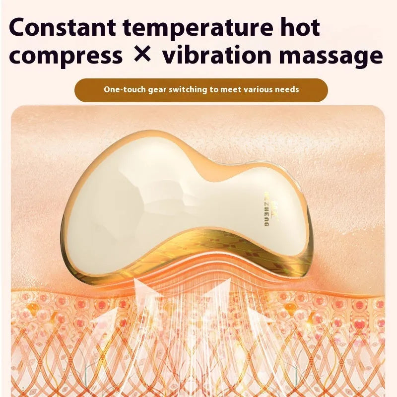 Gold coloured electric Gua Sha facial massage tool with a smooth metal scraping plate.