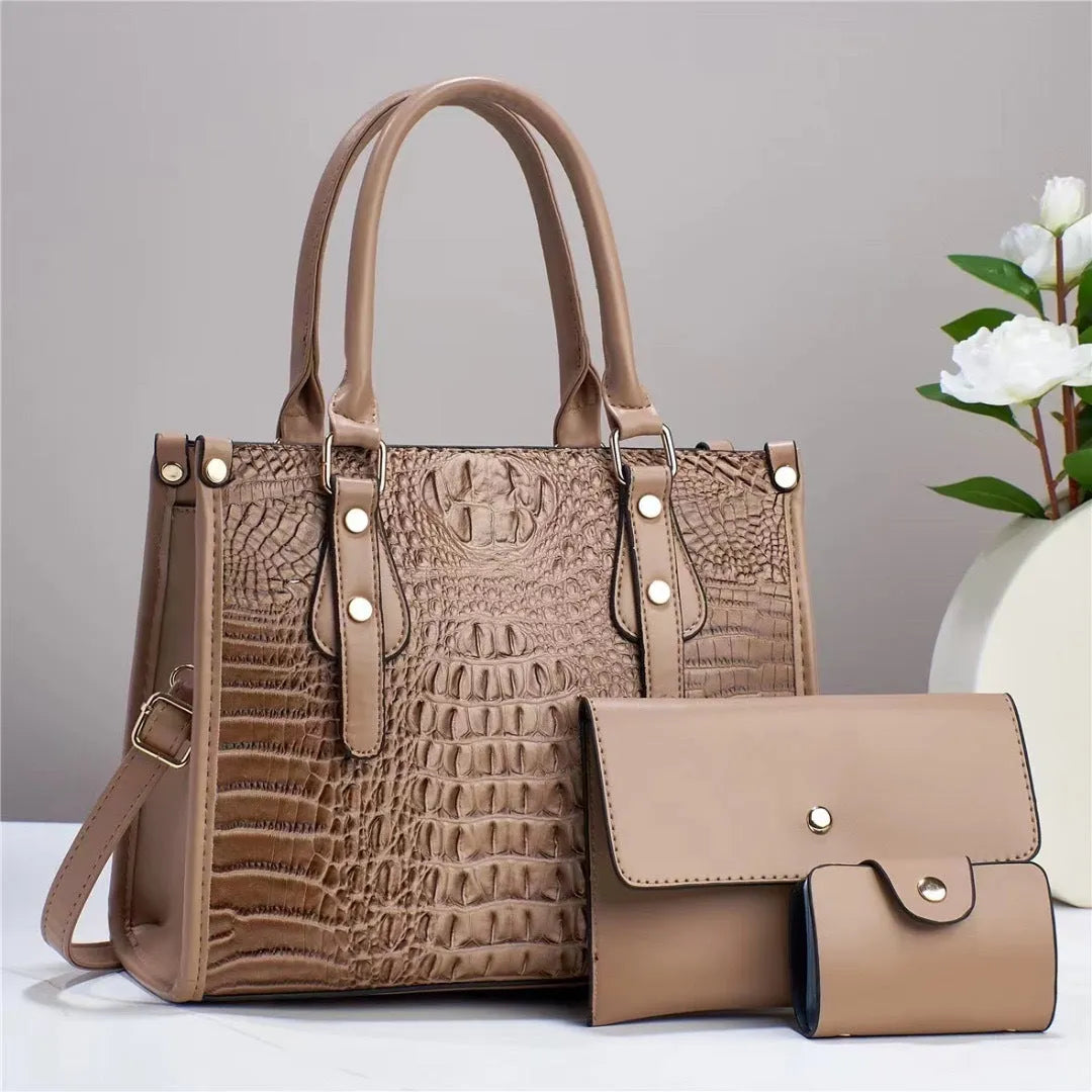 Three-piece PU bag set in chosen colour showing bucket crossbody bag, matching wallet, and card holder.