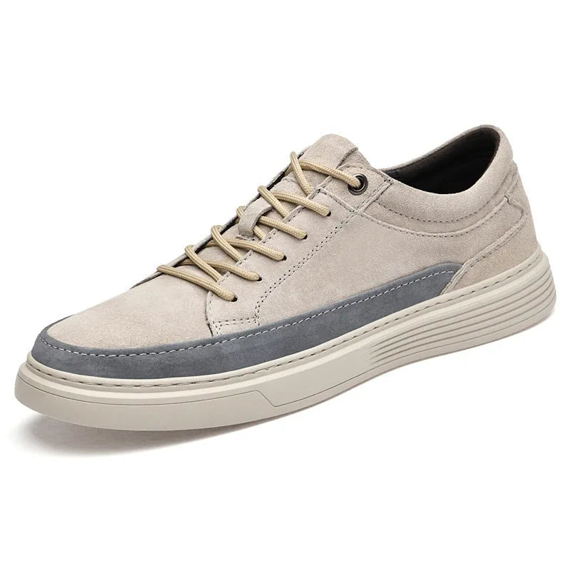 Men's grey casual skate shoes with pigskin upper and rubber sole on a white background