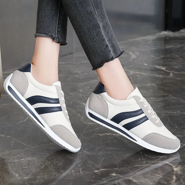 Red lace-up casual sneaker with soft rubber sole and pu mesh upper