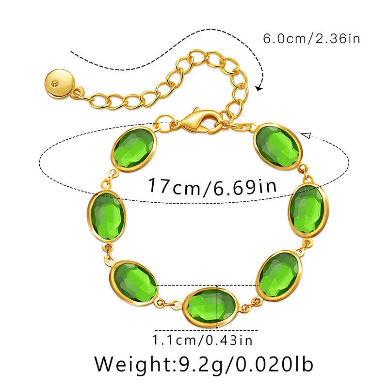 Geometric elliptical women's bracelet with blue glass inlay on an 18K copper band.