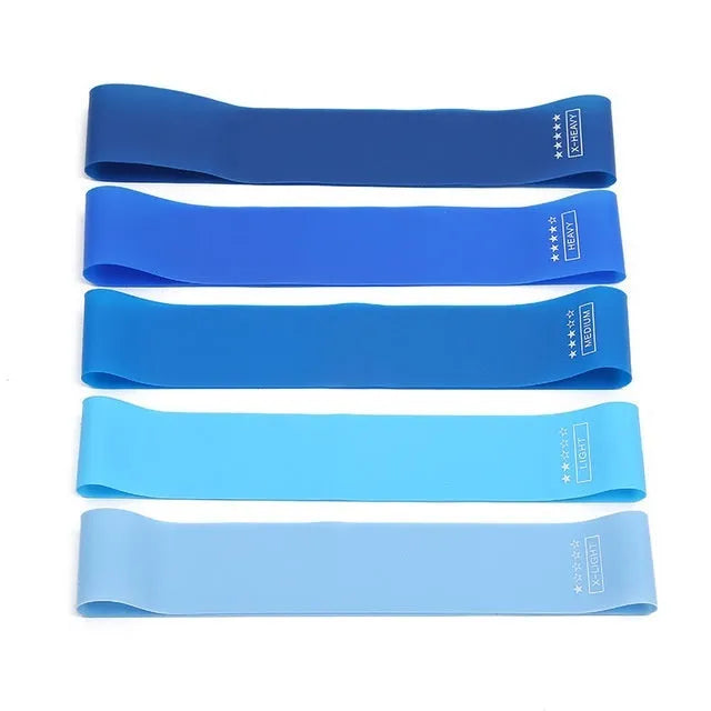 Five colour-coded TPE yoga tension straps with graduated thickness for resistance training