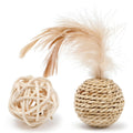 Two cat toys: hollow rattan ball and faux feather ball with bell on primary coloured background