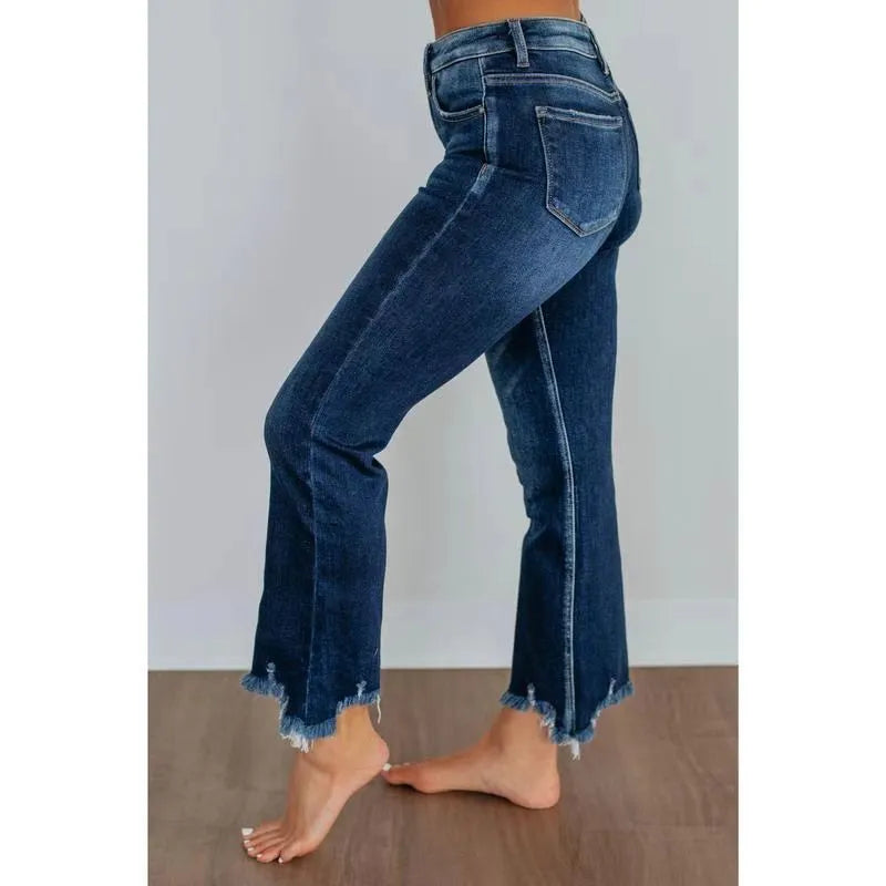 Women's solid colour denim jeans with hand-worn detailing in dark blue and light blue options