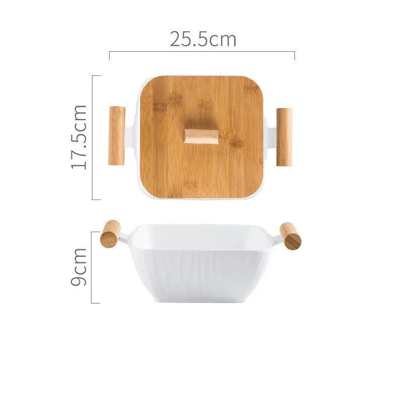 Porcelain ceramic bowl with irregular shape and matching lid in modern design