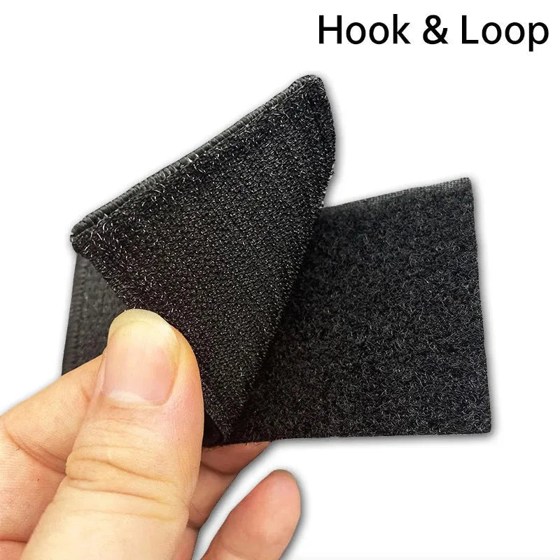 Outdoor embroidered fabric badge with Velcro backing on a tactical vest.