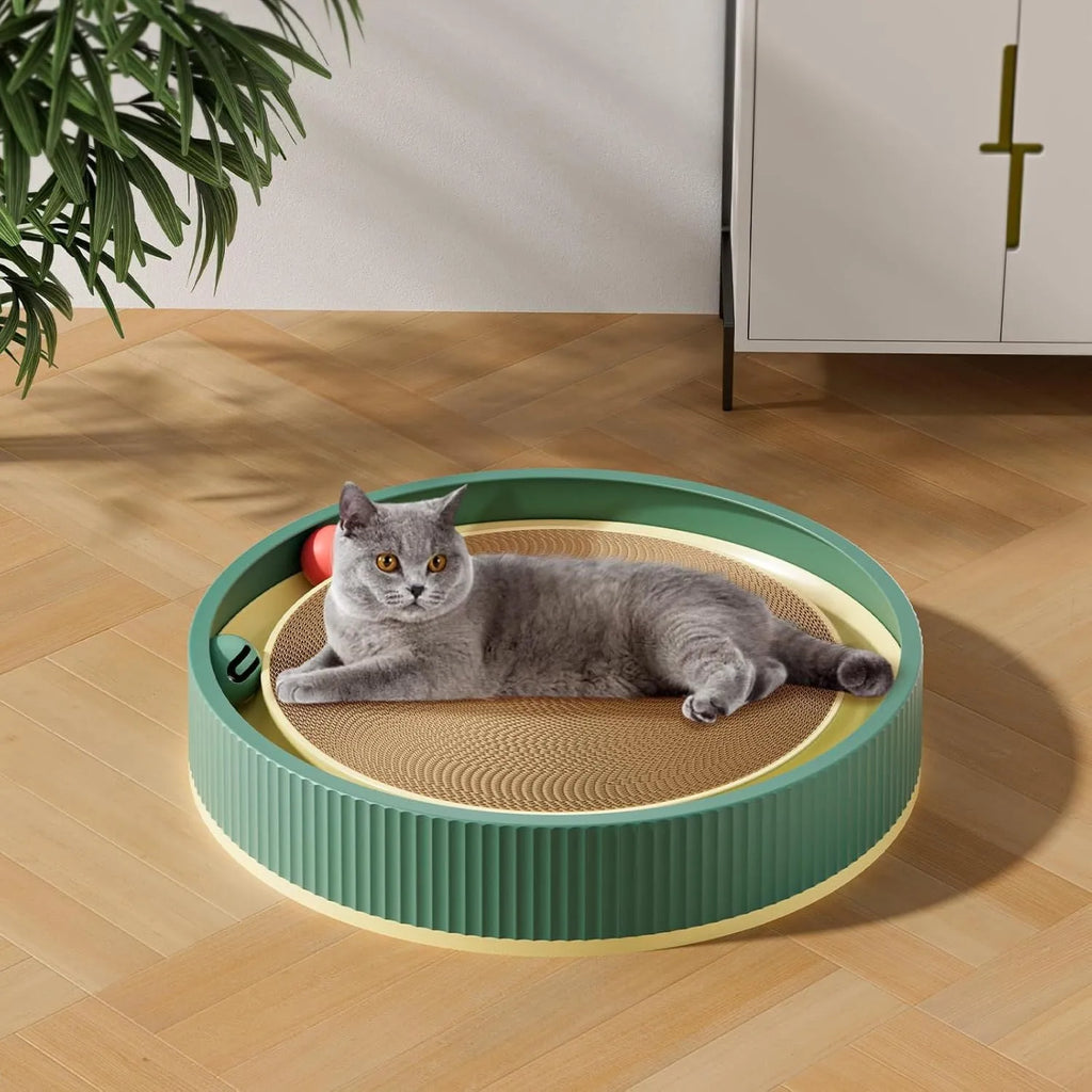 Large circular cat scratching board with integrated ball toys and replaceable cardboard core