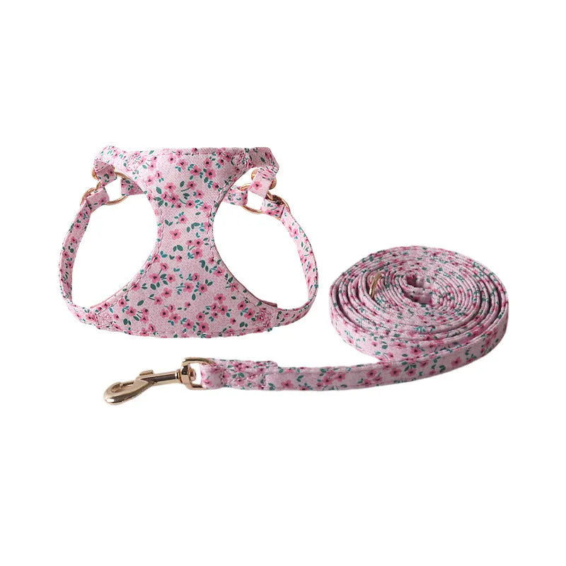 Floral pattern pet harness suit with matching leash in cloth material showing size options
