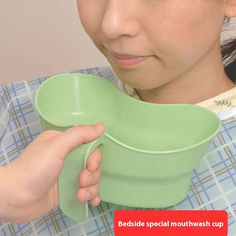 Green plastic gargle cup for bedridden elderly patient oral care and hydration