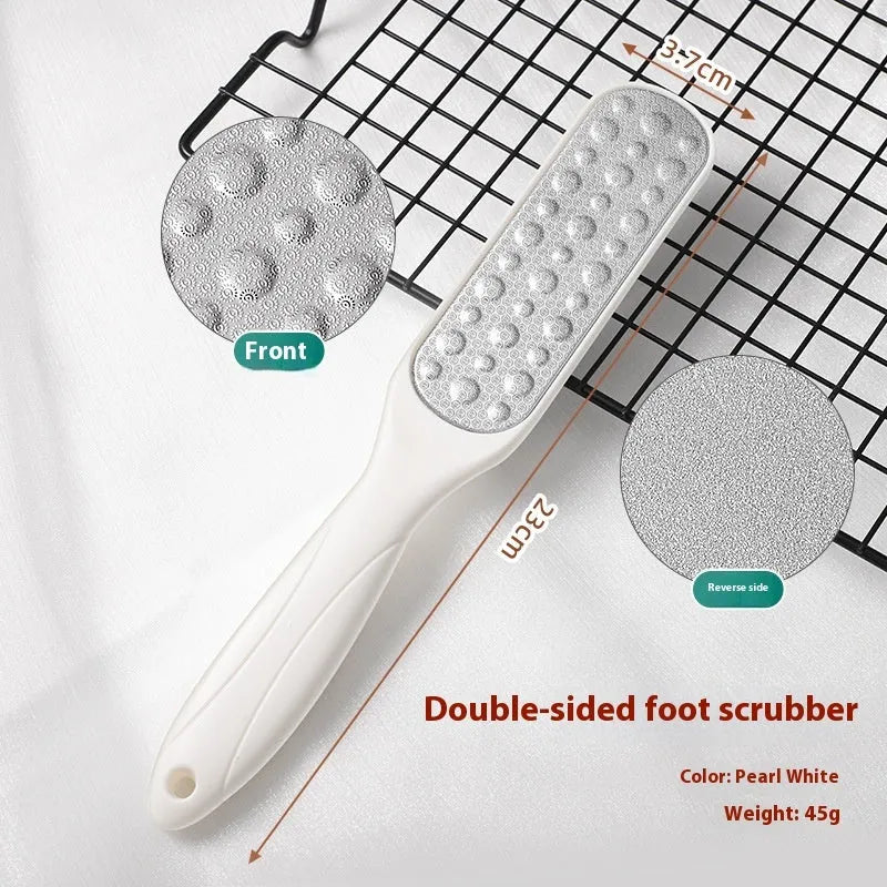Stainless steel double-sided foot grinder tool for callus removal and foot care.