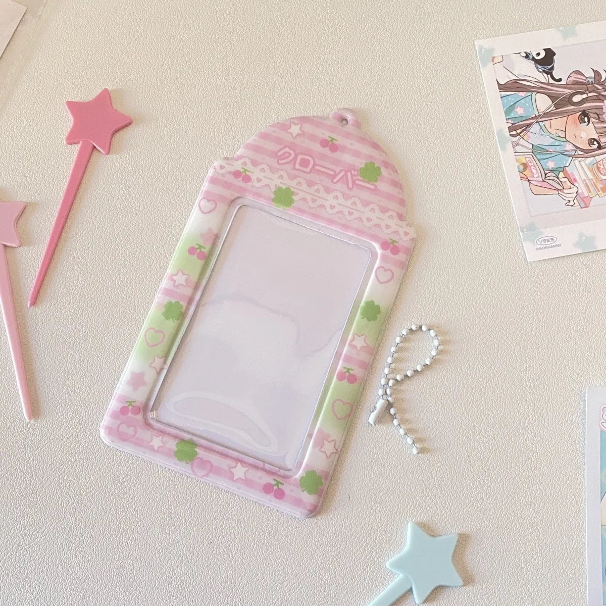 Cartoon strawberry and four-leaf clover PVC card holder pendants for ID and meal cards.