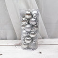 Assortment of shiny matte finish 3cm Christmas ball ornaments in gold, red, silver, and blue colours.