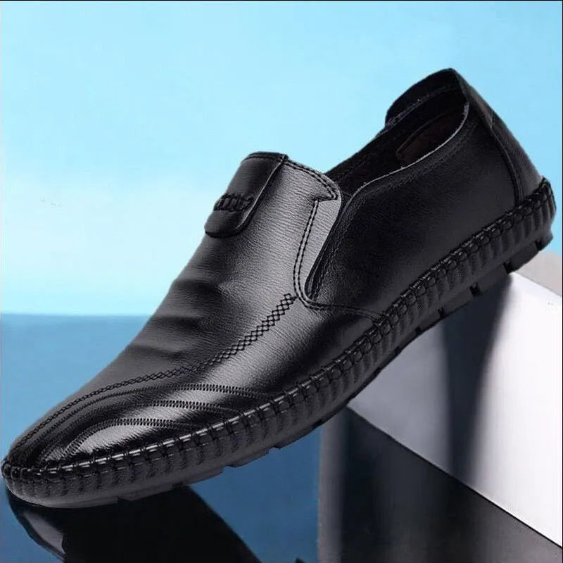 Men's black and brown PU leather flat loafers for business-casual spring wear.