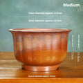 Indoor antique carved ceramic flower pot in purple sand clay with old pile texture