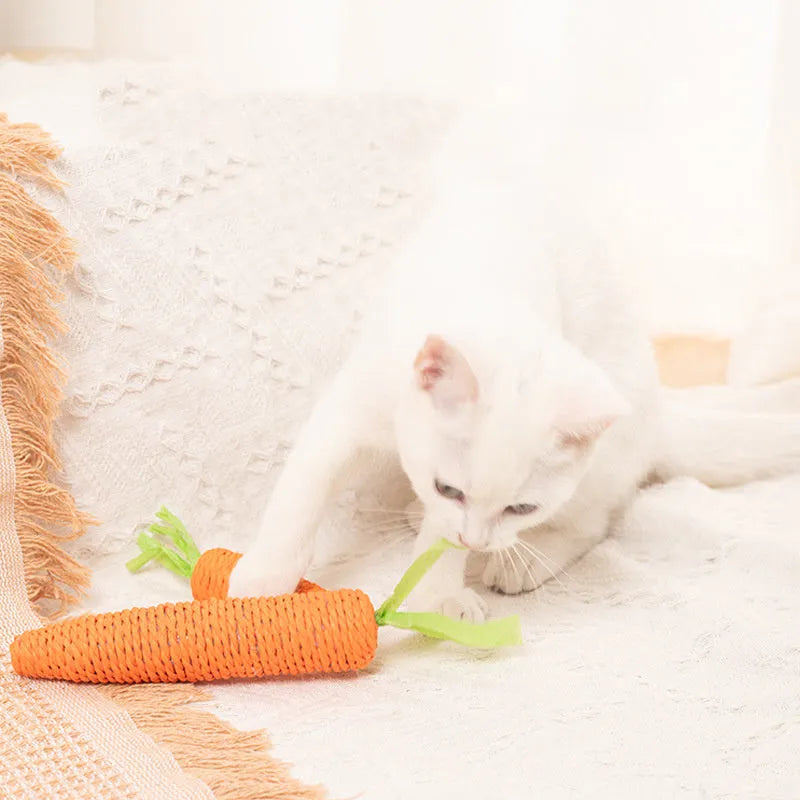 Assortment of cat toys including paper carrots, ringing stones, and textured chewing sticks in two size options, L and S.