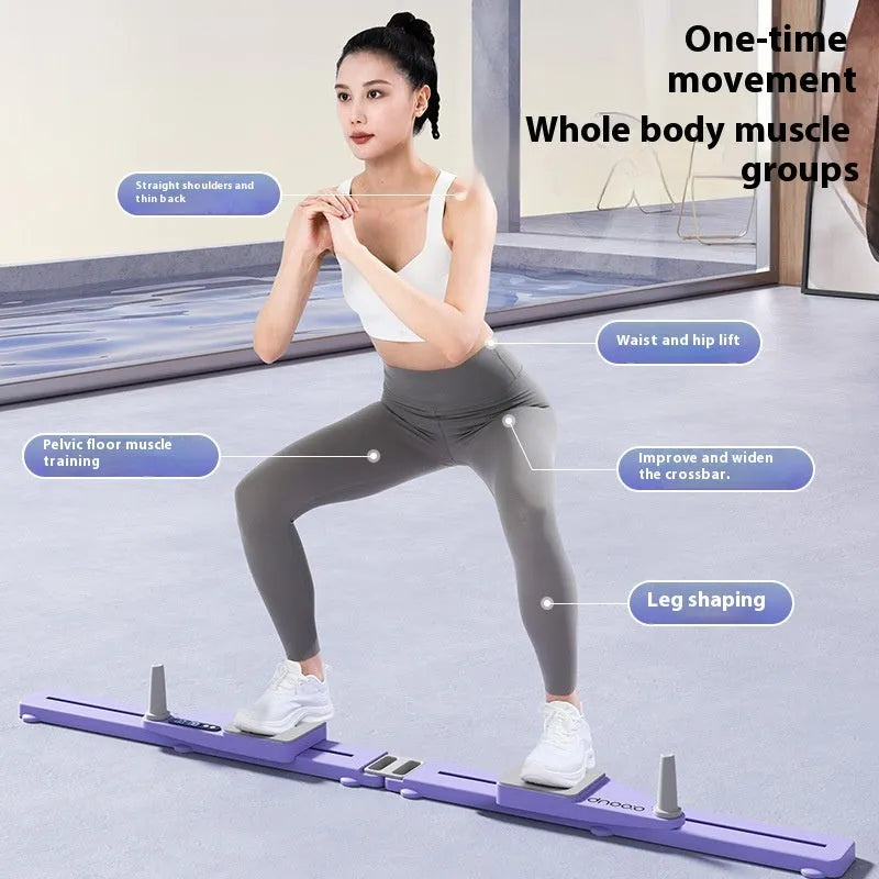 Compact purple split skiing machine trainer for home fitness on a wooden floor.
