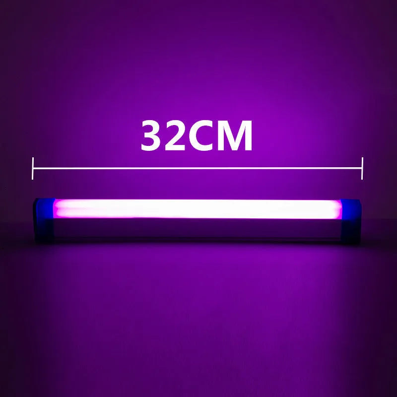 Blue and purple rechargeable dimmable LED tube stick light in 32cm length on a dark surface.
