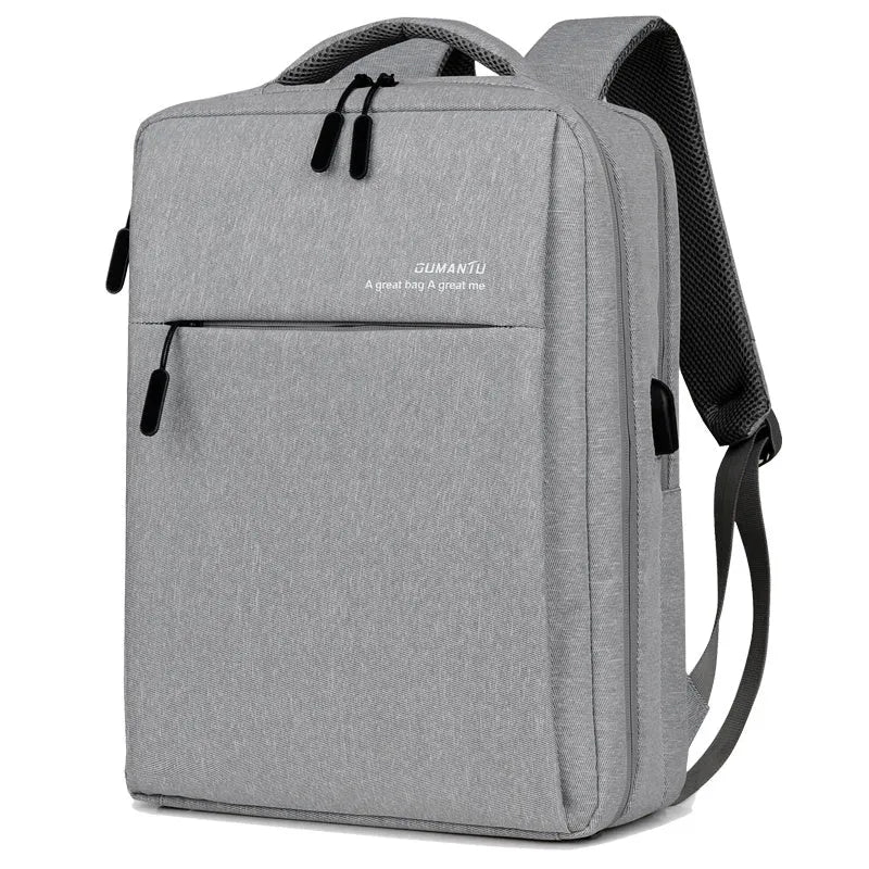 Black waterproof laptop backpack with USB port open, showing padded laptop compartment and internal pockets.