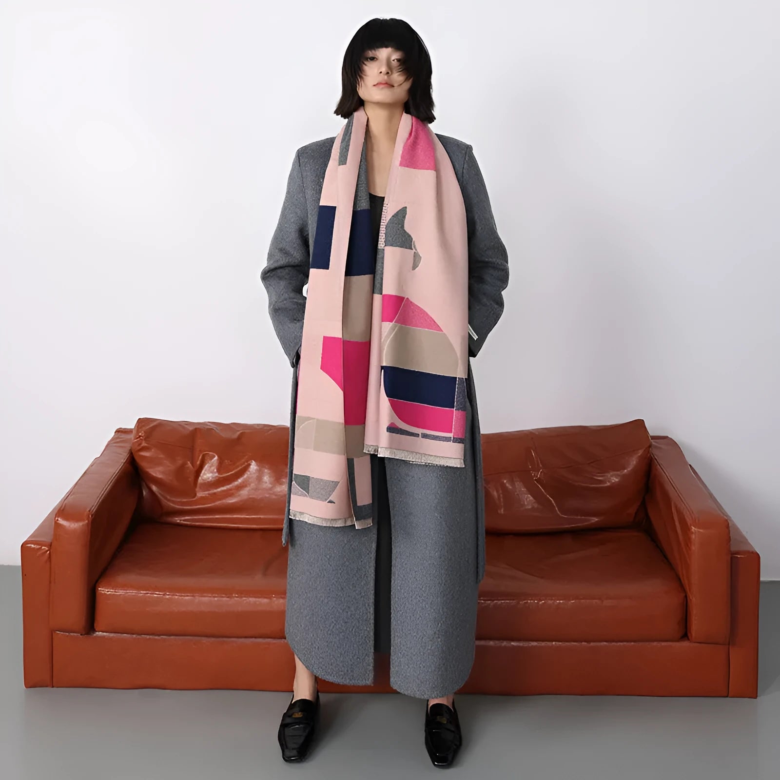 Long beige imitation cashmere scarf draped to show its 185cm length and texture.
