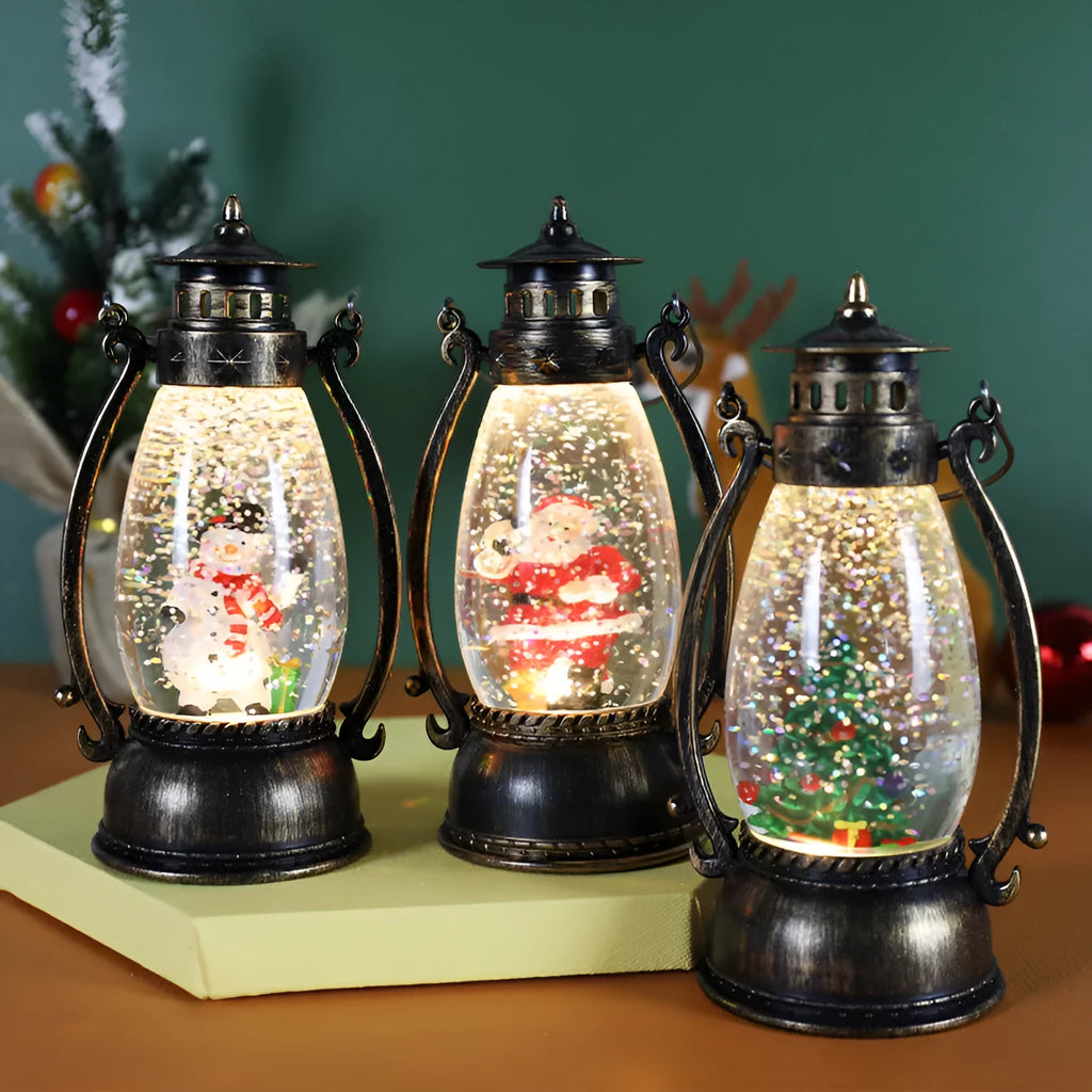 Plastic Christmas desktop oil lamp decoration with a glowing crystal ball and snowman figure.