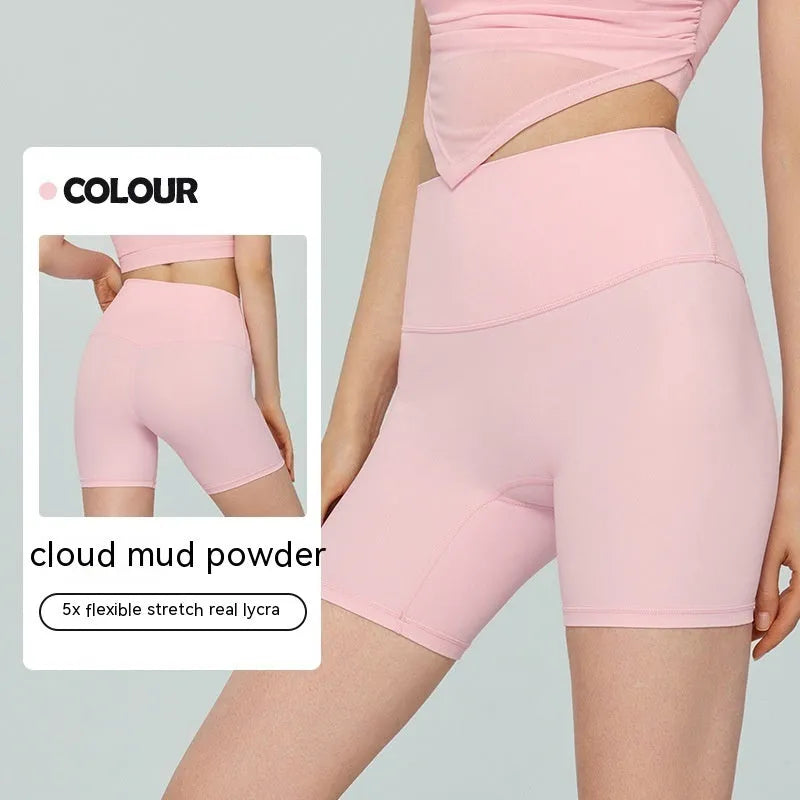Women's high-waisted Lycra yoga shorts in Leaf Green colour, shown for yoga and fitness use.