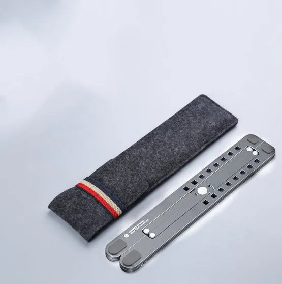 Foldable aluminium laptop stand in silver, shown open at an angle and folded flat.