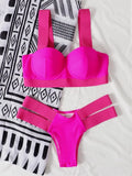 Women's rose red steel bracket push-up bikini swimsuit laid flat.
