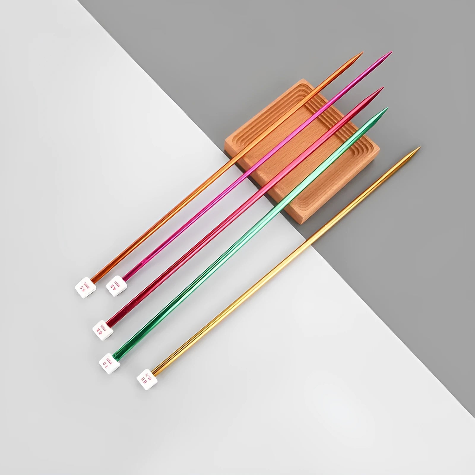 Complete crochet hook set showing 14 different sizes from 2.0mm to 10.0mm with protective caps