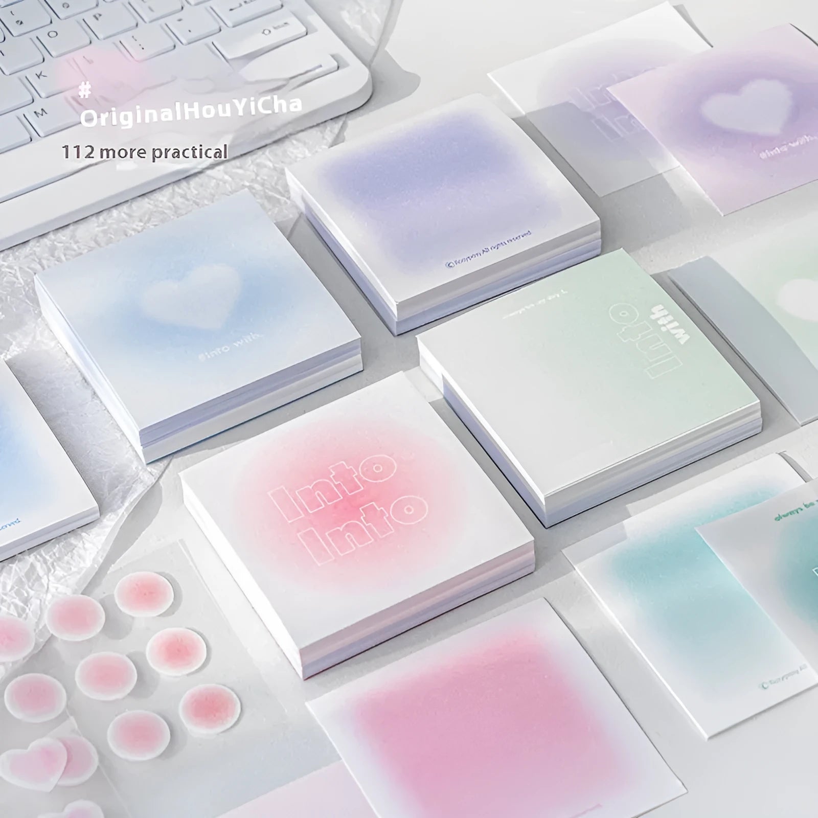 Square 70mm multifunctional notepad with gradient colour cover, showing sticky notes and parchment inner pages.