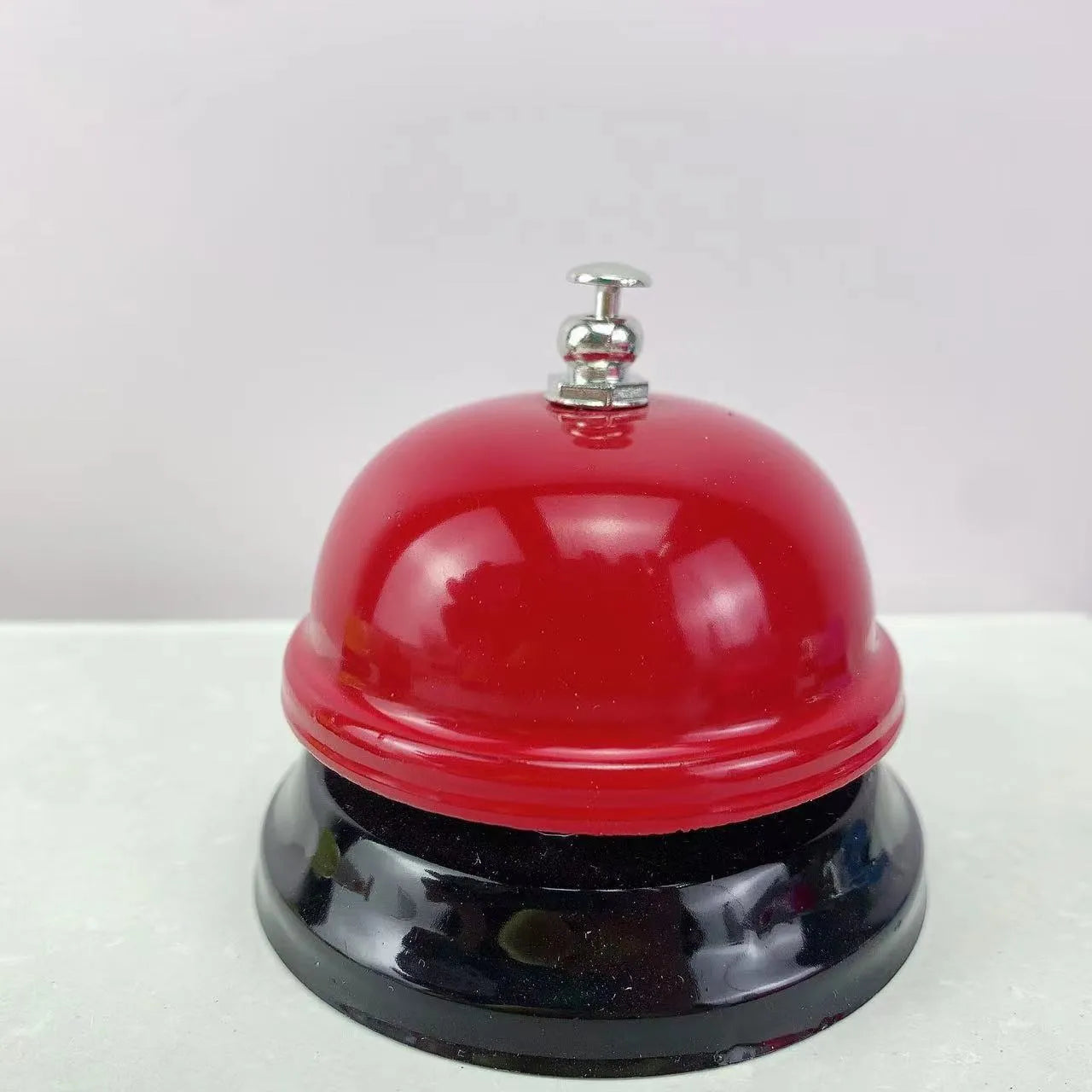 Iron game bell in various colours for classroom and restaurant use
