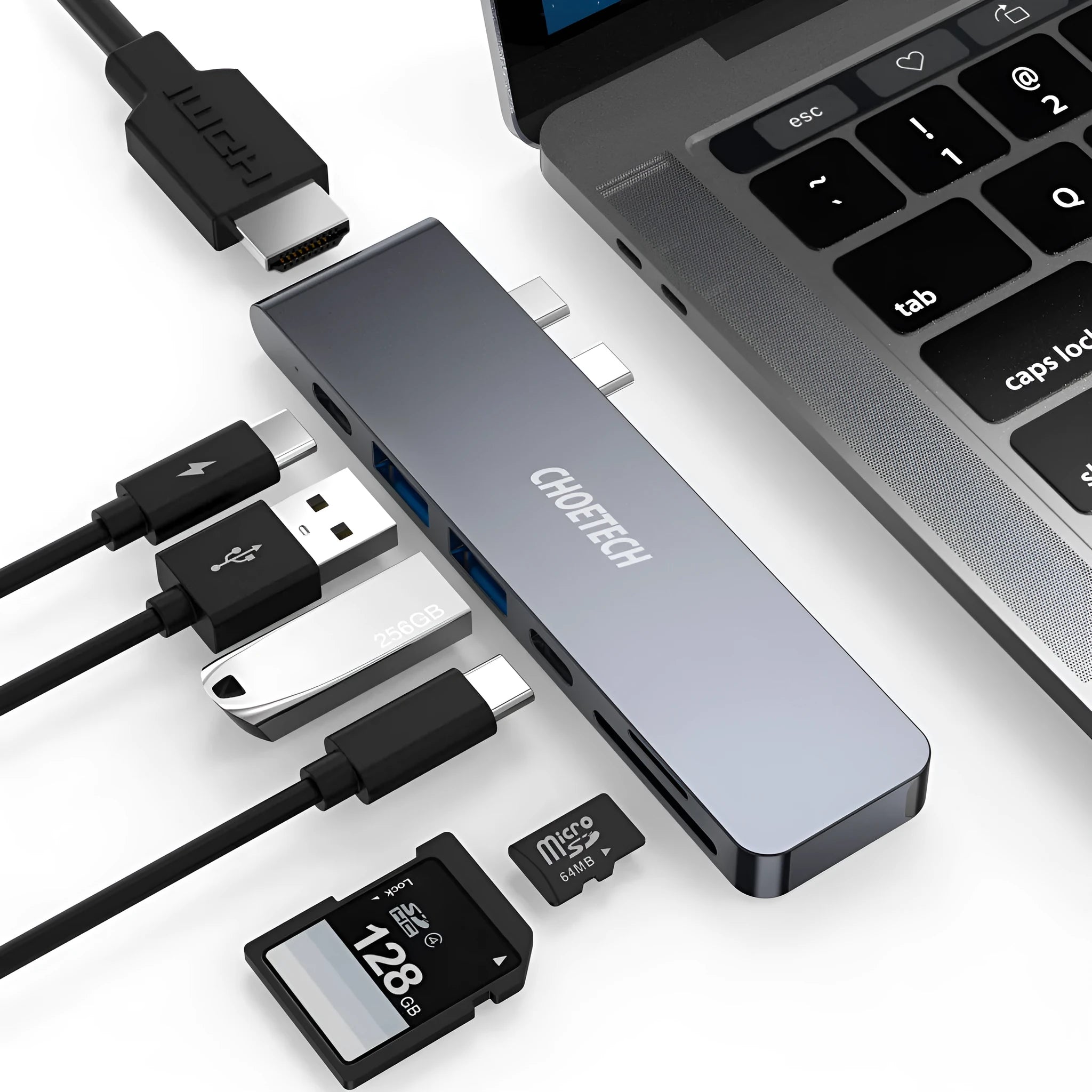 Silver aluminium USB-C 7-in-1 adapter hub with SD card slot, Micro SD slot, HDMI, USB 3.0, and USB-C ports