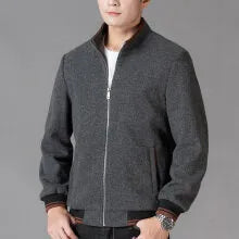 Men's grey zip-up fleece jacket with a stick pocket, shown in a sports style.