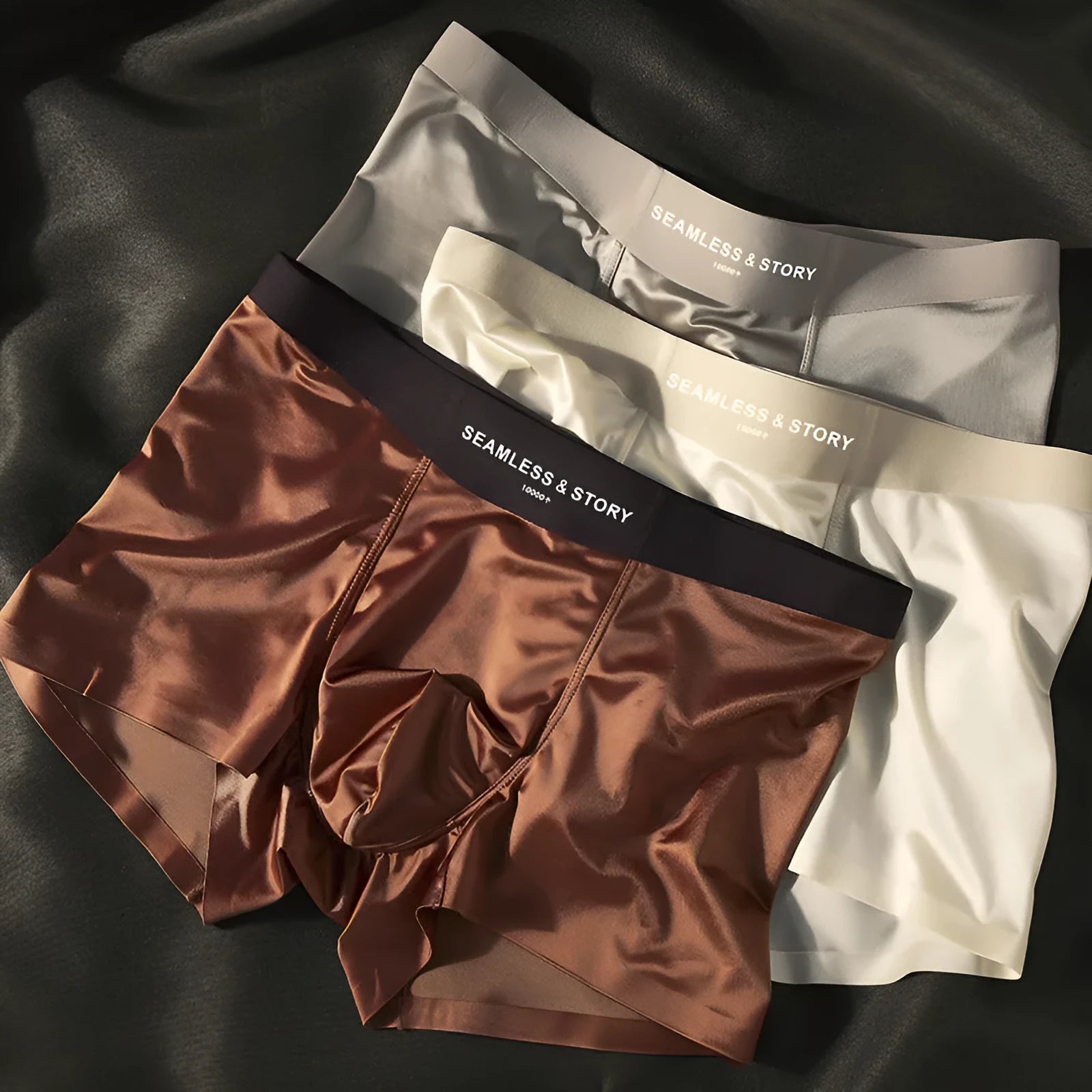 Men's ice silk satin boxer shorts on a white background, showing mid-waist design.