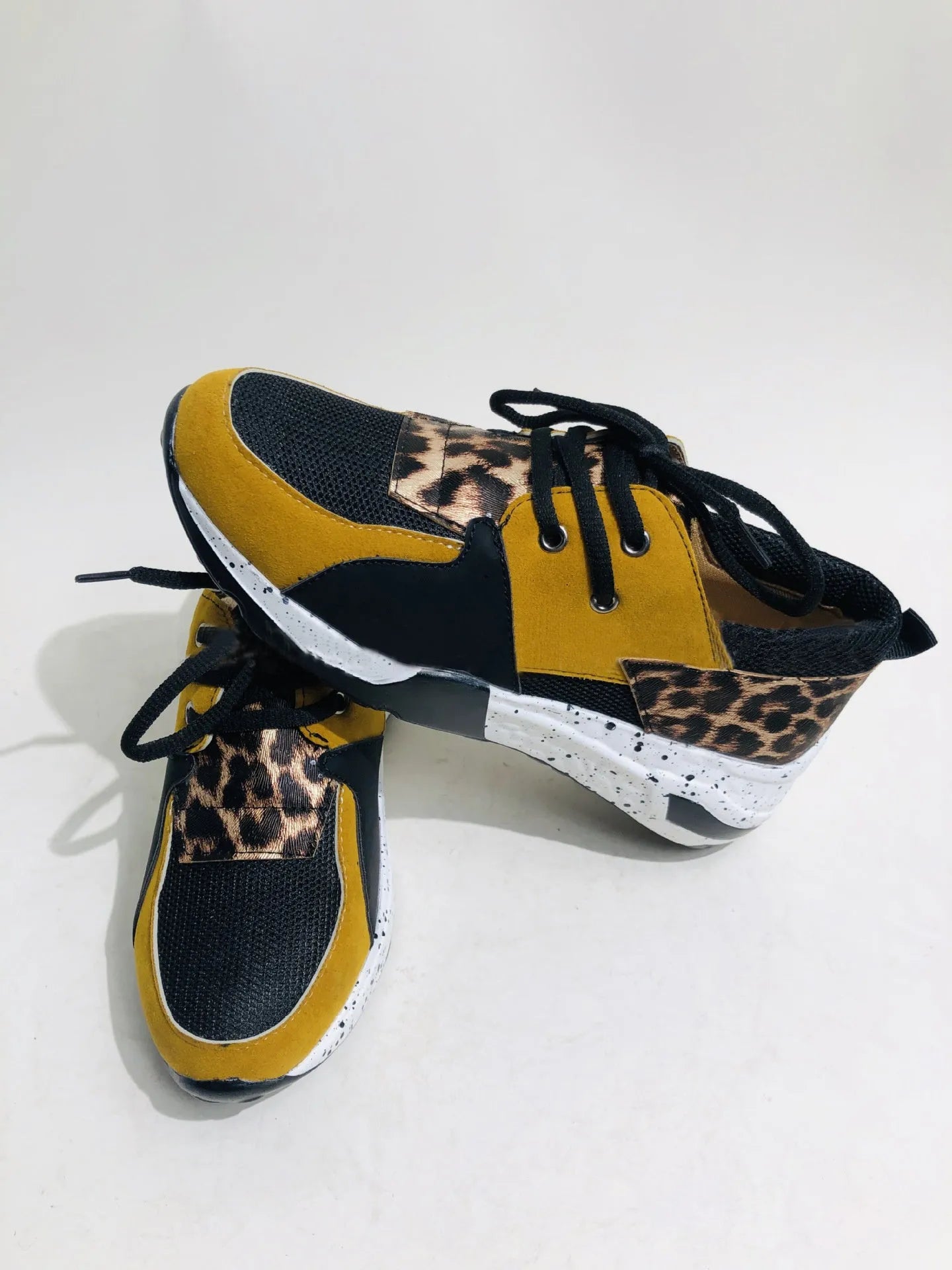 Women's casual flat sneakers with suede upper and wedge heel in multiple colour options