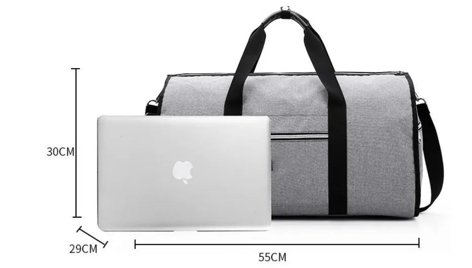 Medium-sized cylinder travel bag in Oxford cloth, shown in one of four colours: black, blue, light grey or red.