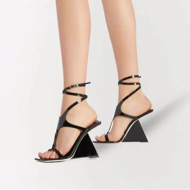 Women's black high heel sandals with a square toe and adjustable ankle buckle on a 9.5cm block heel.