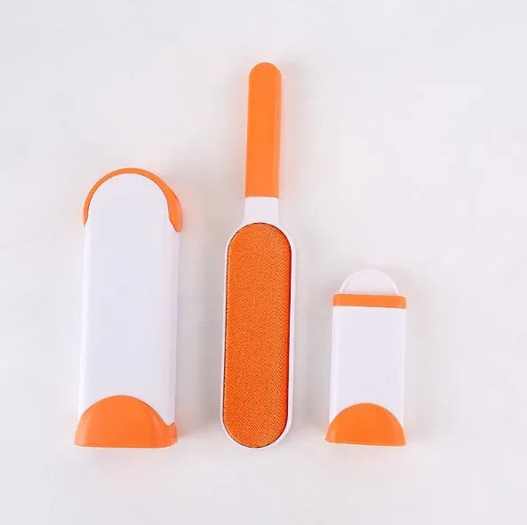Blue reusable pet hair removal brush with self-cleaning base for sofas and upholstery.