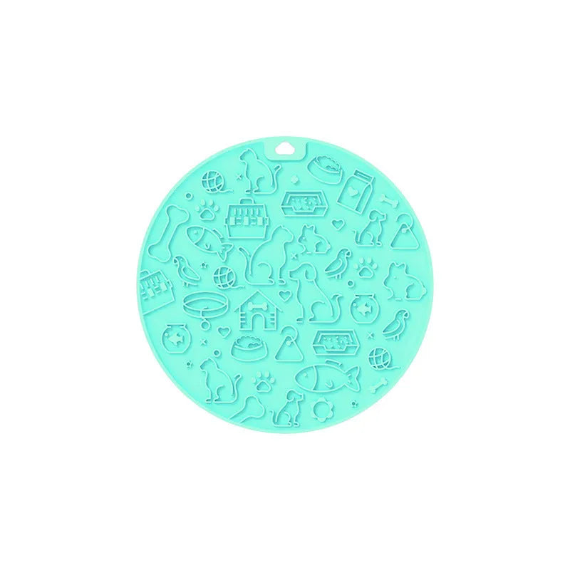 Round blue silicone pet licking mat with suction cup and textured surface for slow feeding.