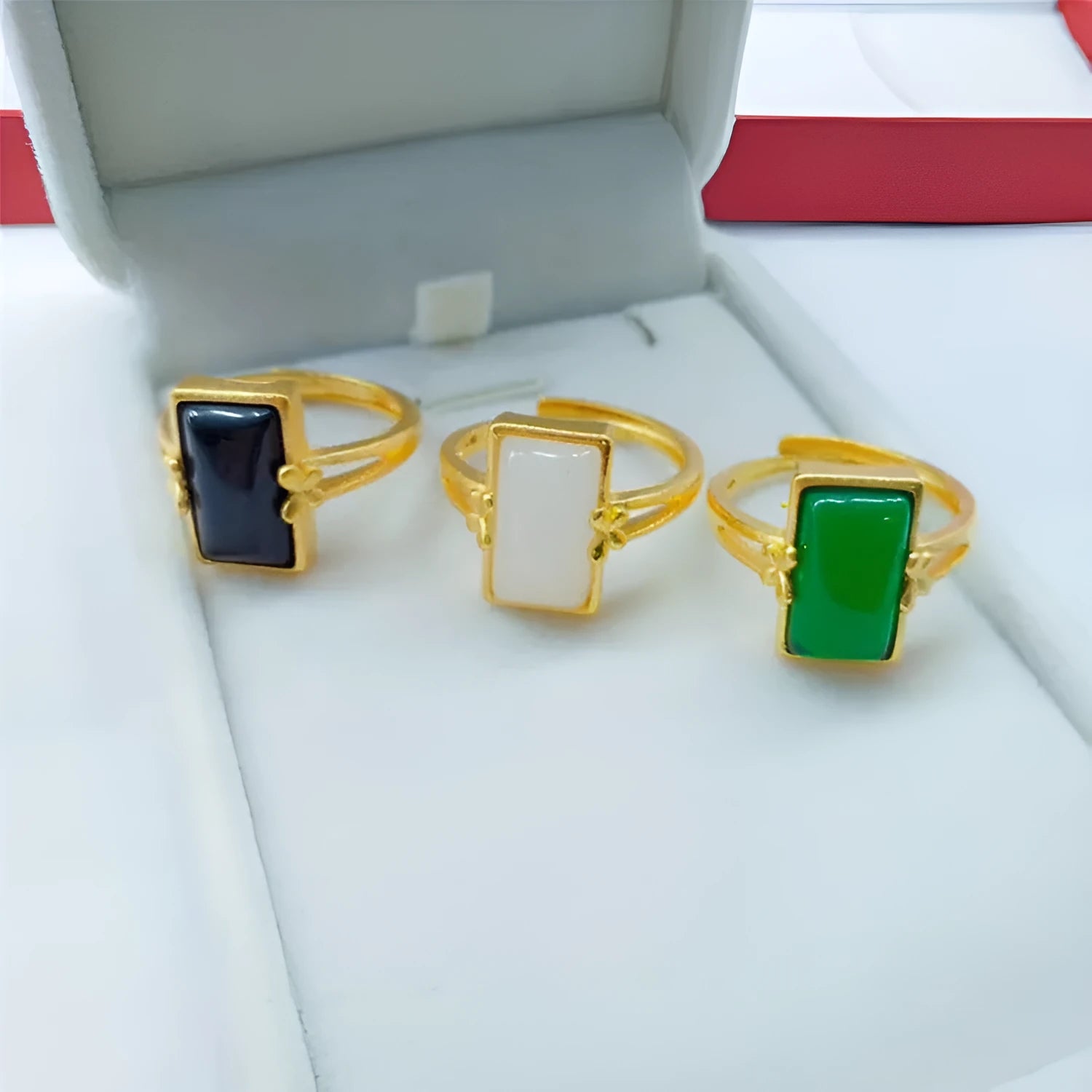 Adjustable brass gold-plated ring with long gemstone in national style design