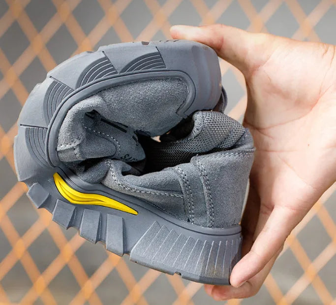 Men's winter high-top velvet cotton safety shoes with steel toe on grey background