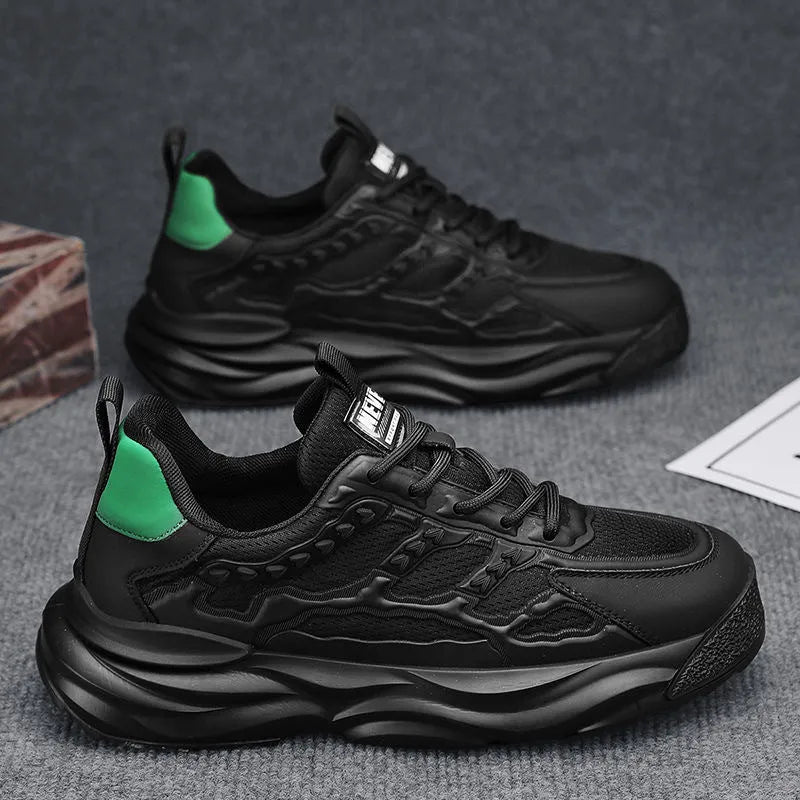 Men's solid colour trainer shoes with PU mesh upper in white or black on a plain background