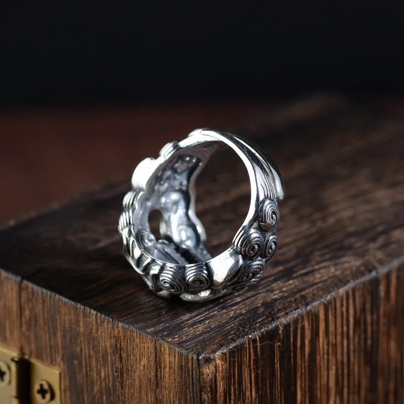 Personalised silver open ring with a detailed jibeast or animal zodiac pattern on a retro-style band.