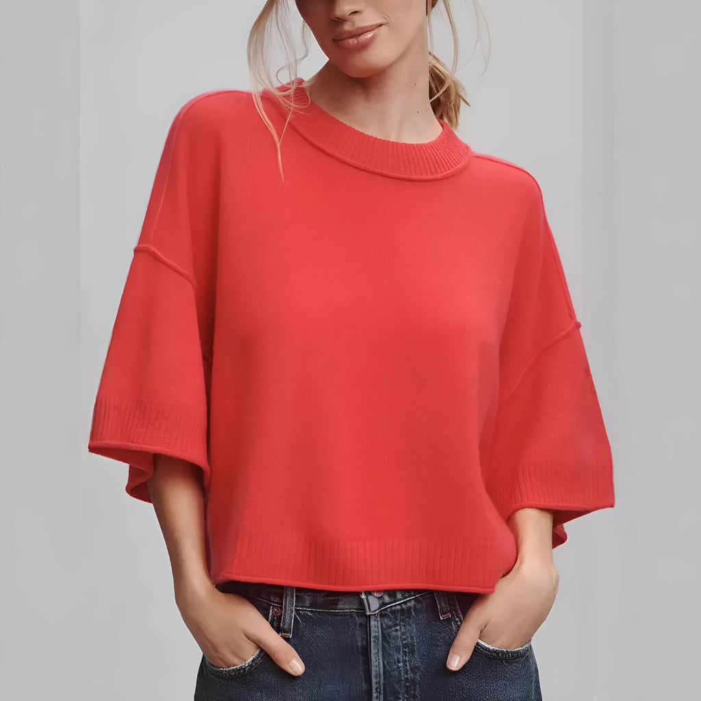 Red short viscose T-shirt with exposed navel styling on a mannequin.