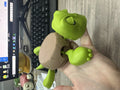 Turtle-shaped ABS coaster in light green colour with heat insulation properties