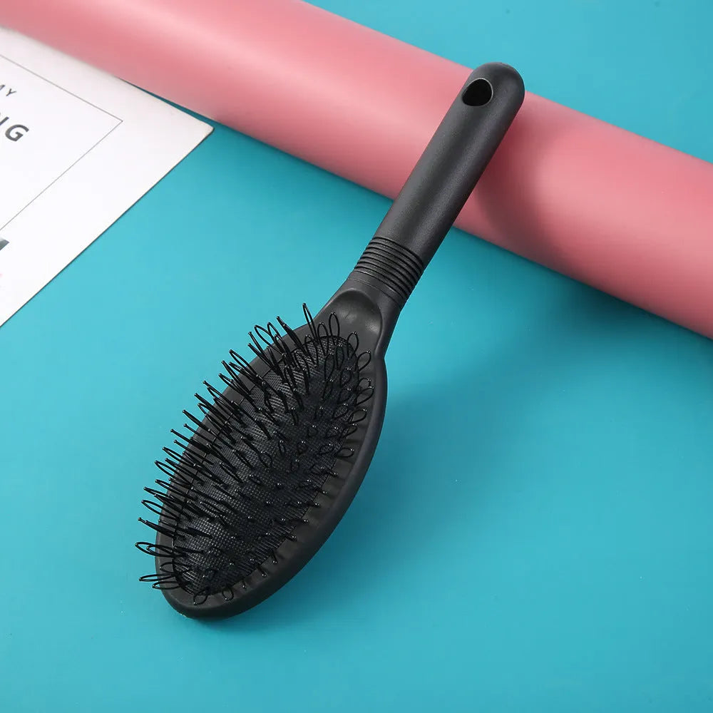 Black or pink plastic hair extension comb with ring teeth, 22cm length