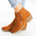 Women's suede ankle boots with a side zipper, chunky heel, in beige colour.