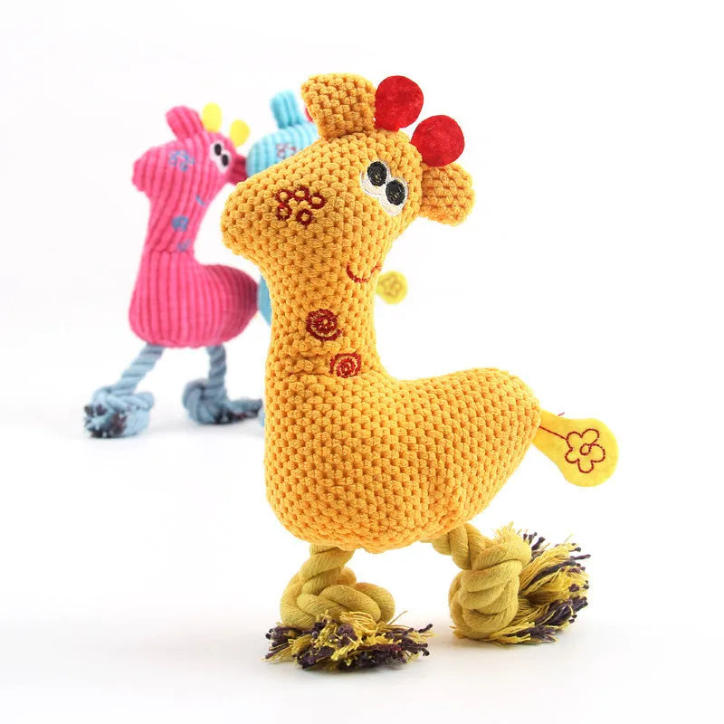 Blue deer-shaped plush dog toy with corn grain texture lying on a neutral background.